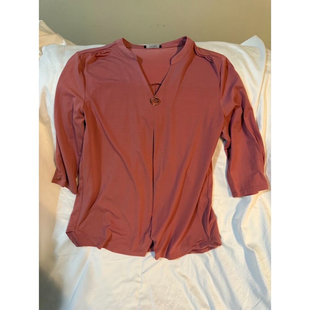 pink top in size large